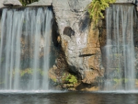 Face portrait of rock between waterfalls-1